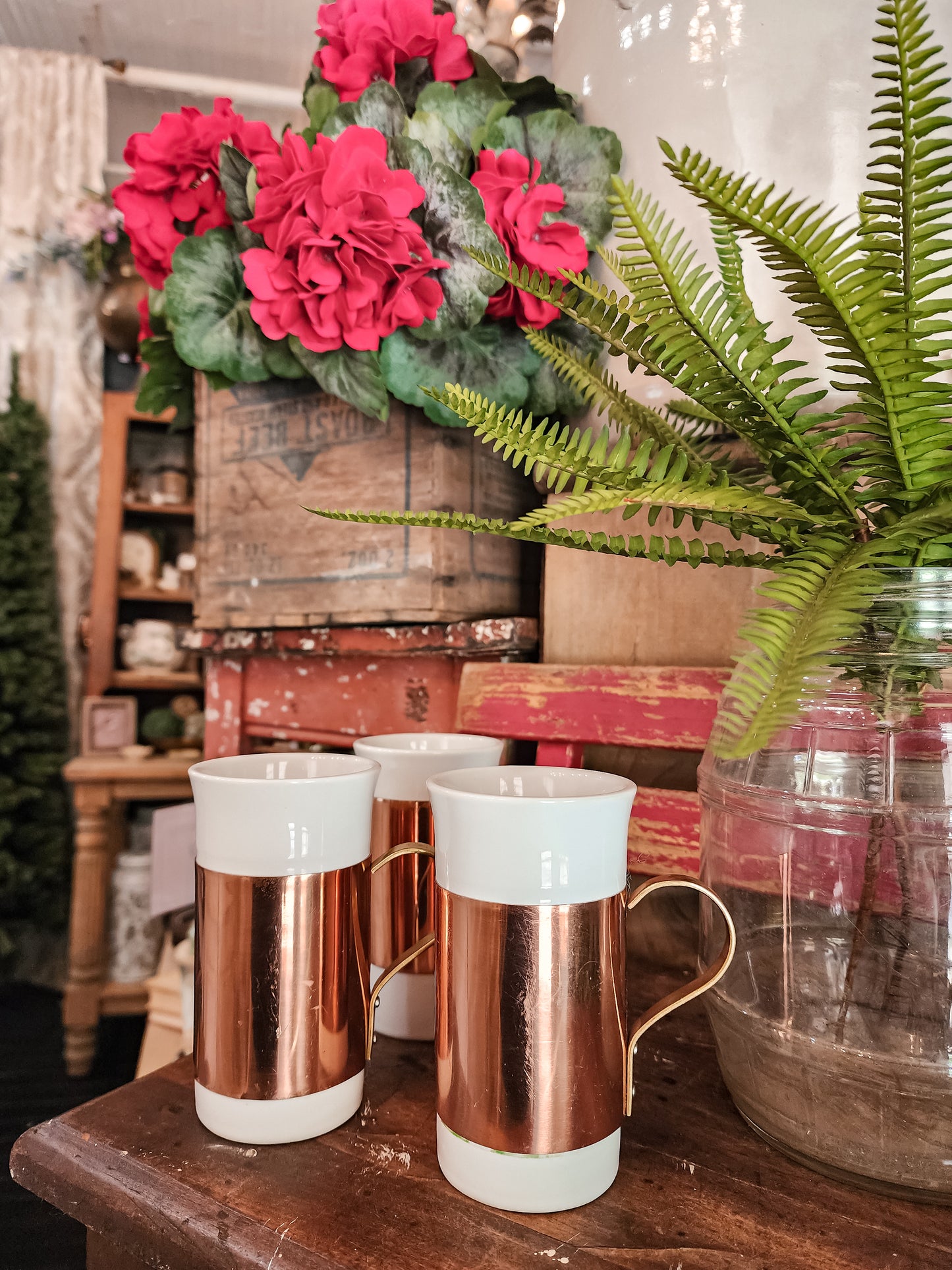 Set of three ceramic and copper mugs